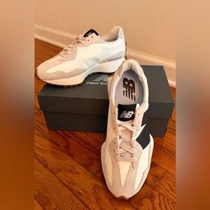 Brand New: Durable uppers made with a combination of suede, nylon, and mesh.